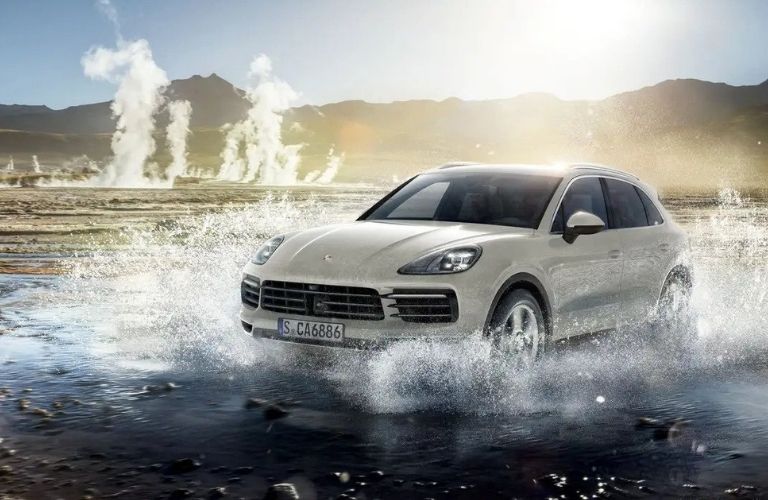 A 2022 Porsche Cayenne is running through water